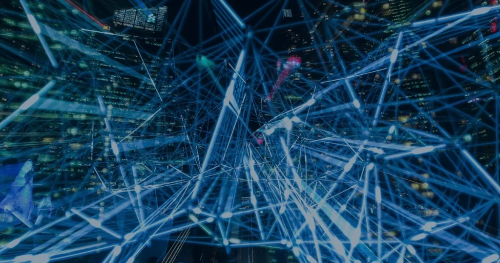 Rede de conexões luminosas ilustrando a Internet das Coisas conectando a operação da empresa